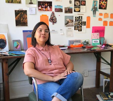 Austin based mixed media artist working in collage and UT Austin alumna Xochi Solis sits in studio and is announced as the inaugural summer start resident 
