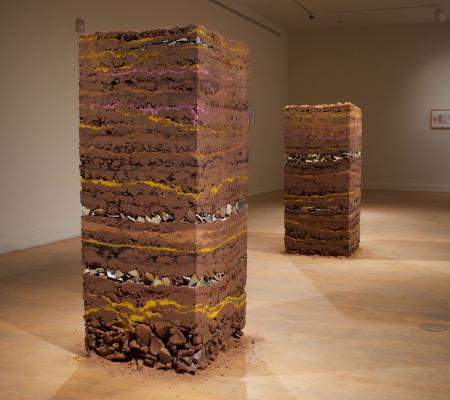 Rectangular stack of clay soil stoneware earthenware and gold created by University of Texas at Austin St Elmo resident and fellow Armando Cortes a Yale graduate and sculptor