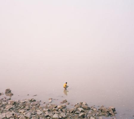 faraway image of someone on a coastline