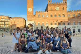 group photo of people  in piazzo in Italy