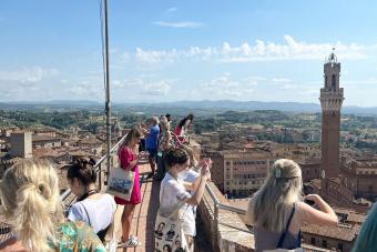 students in tower overlooking Siena Italy