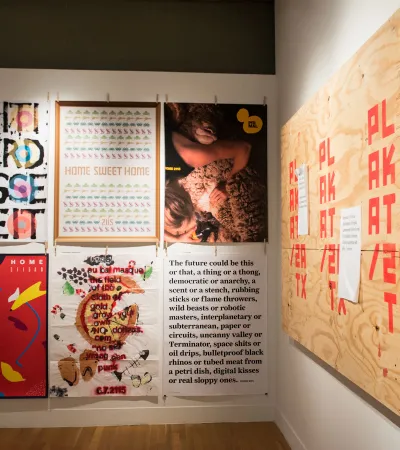posters on wall in gallery