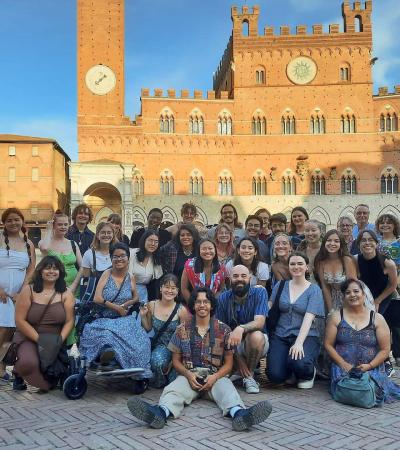 group photo of people  in piazzo in Italy