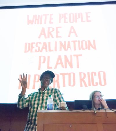 two people standing at lecturn during lecture