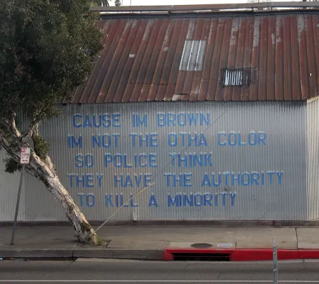 text written on side of steel wall