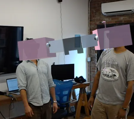 two users with hololens and flamingo hologram