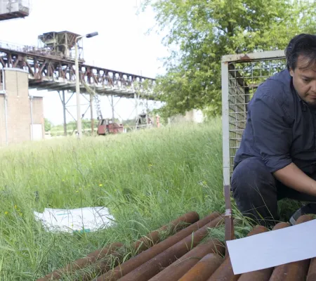 artist at work on materials