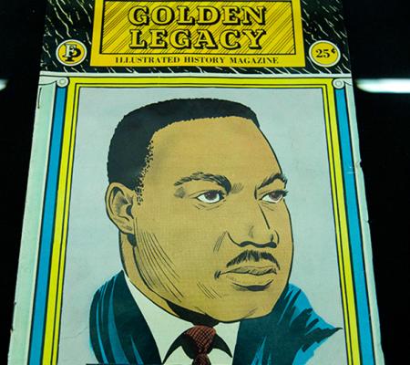 image of Martin Luther King Jr on a cover of a magazine in color illustration from renowned UT art historian Eddie Chambers' collection. 