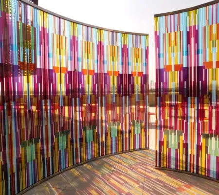 hand painted glass large scale sculpture in the shape of a spiral close up