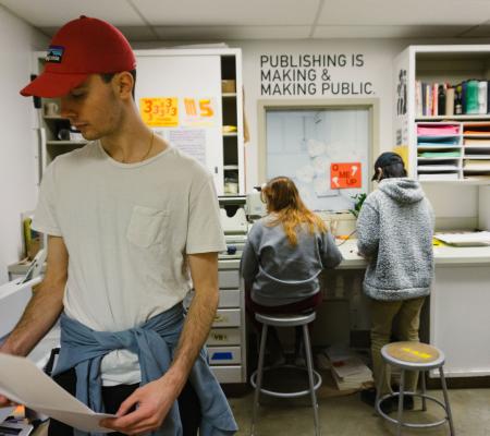 Image of the University of Texas at Austin Risograph Print Room in use by students in the Department of Art and Art History