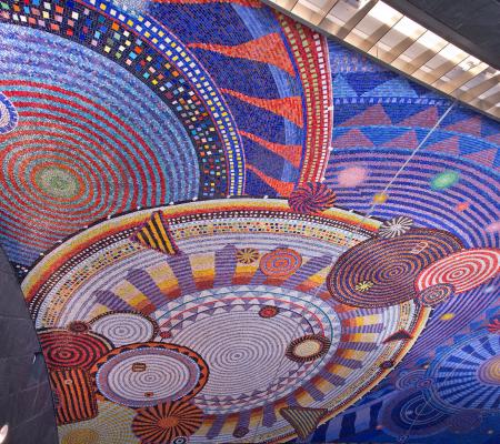 A psychedelic public artwork piece in a subway station entitled Funktional Vibrations by  Xenobia Bailey