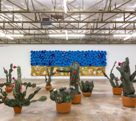 installation view of soft sculpture cacti