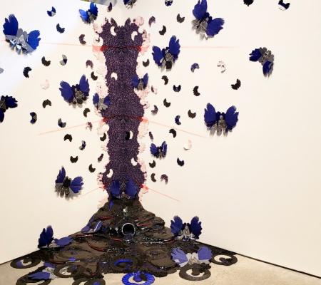 installation involving black ooze in gallery