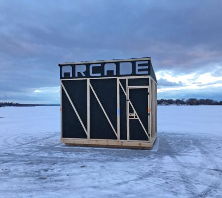 outdoor ice shed with handmade sign that reads Arcade depicted in documentation of work from Kyle Peets
