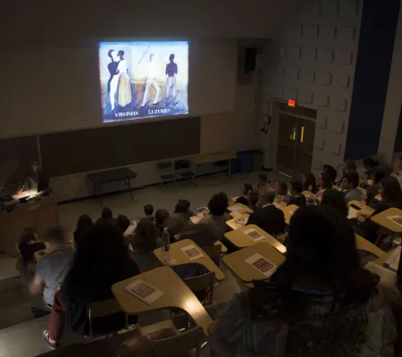 full room in a dark lecture