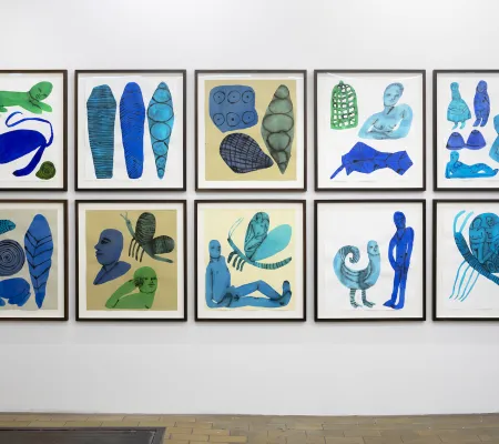 installation image of a set of ten prints stacked in two rows of five