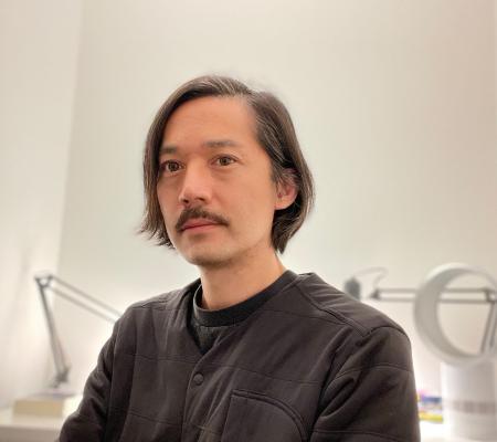 Portrait of curator and director Howie Chen