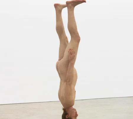 silicone figure of White male upside down