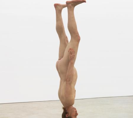 silicone figure of White male upside down