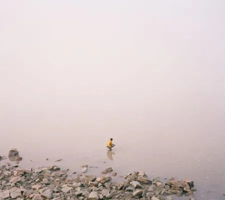 faraway image of someone on a coastline