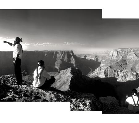 black and white image of two people at the Grand Canyon
