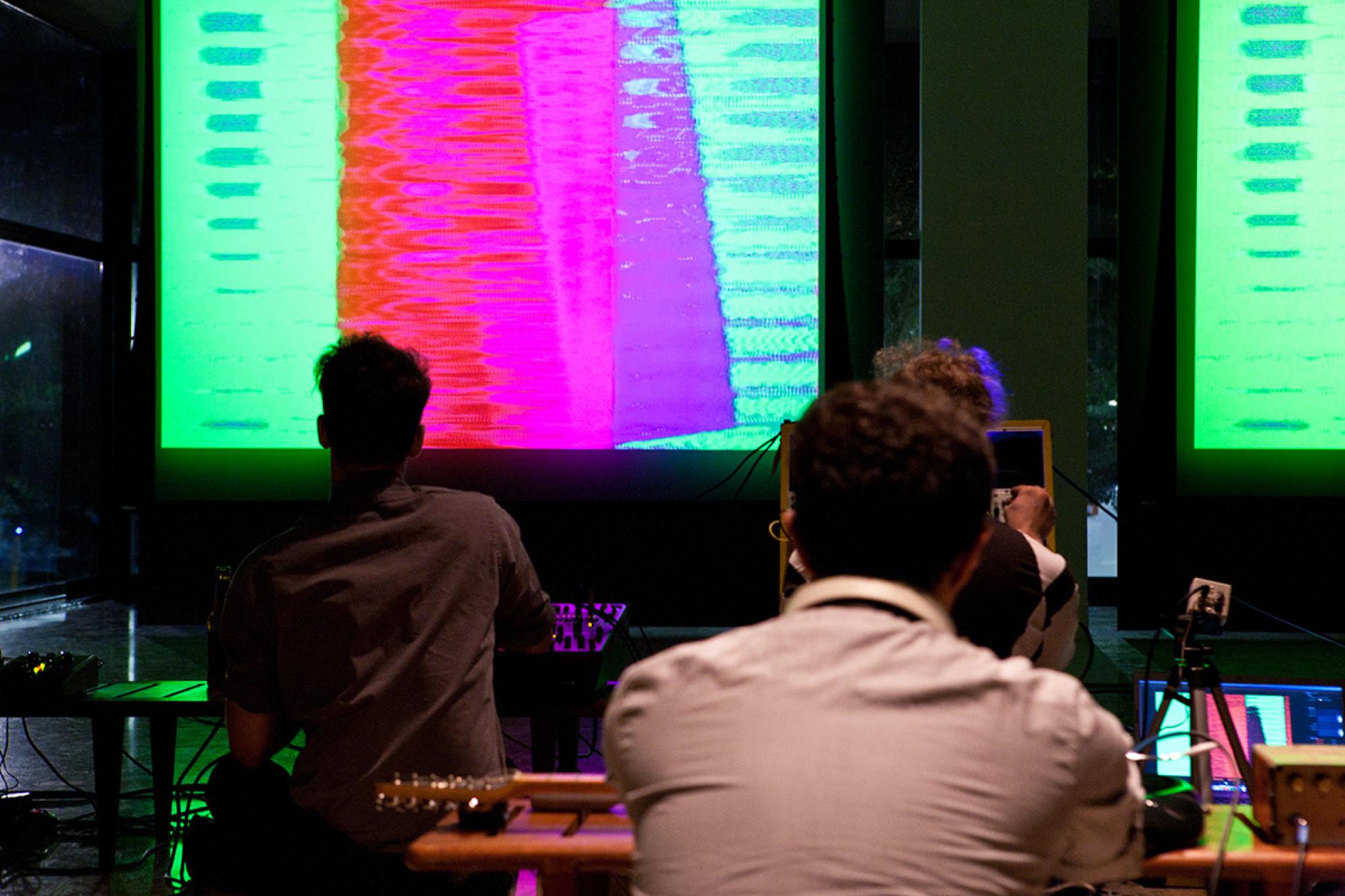 students in front of projection screen