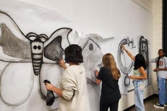 students drawing in classroom