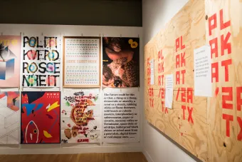 posters on wall in gallery