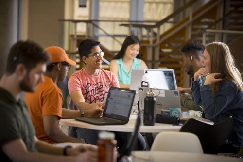 students studying together at table