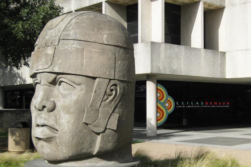 statue of Olmec head outside Benson library