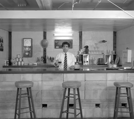 Documentation still of artist and UT Austin Studio Art and Transmedia professor Michael Smith's acquired work by MOMA Government Approved Home Fallout Shelter Snack Bar 1983