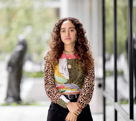 portrait of graduate Angelique Rosales Salgado who now works as a curatorial fellow for MoMA and the Studio Museum in Harlem