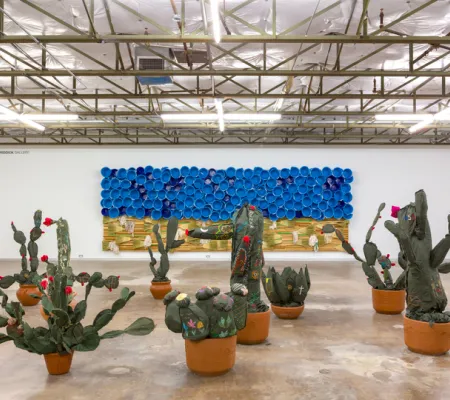 installation view of soft sculpture cacti