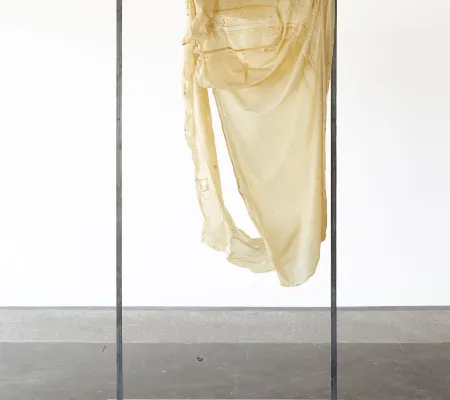 image of bar type pedestal holding up transparent skin like film