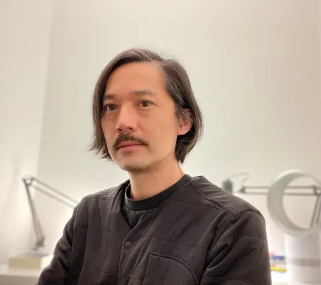 Portrait of curator and director Howie Chen