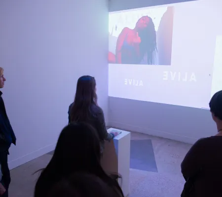 people looking at video in gallery