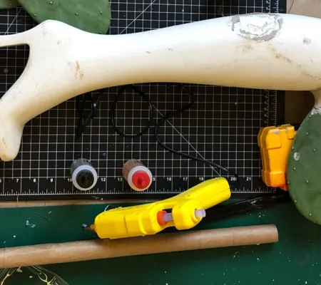mannequin leg on cutting mat