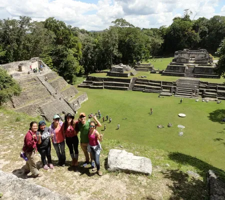 students standing on pyramid