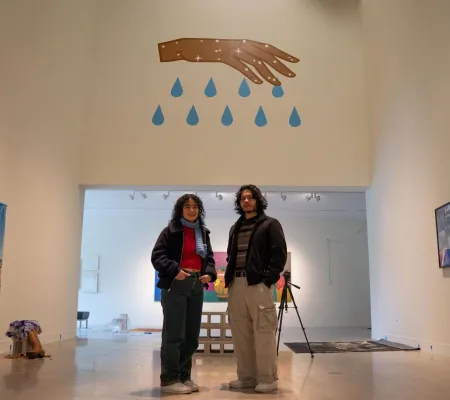 image of two people in an art gallery