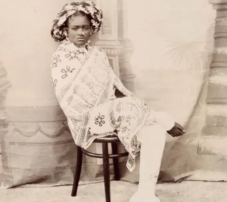 image of a person sitting in a chair in sepia tones