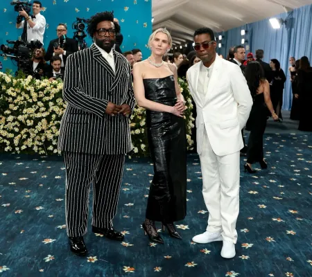 image of three people at the met gala