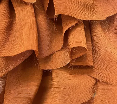 pieces of woven clothe layered over one another