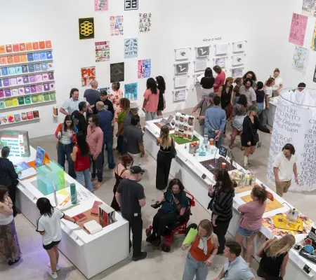 people in gallery during art opening