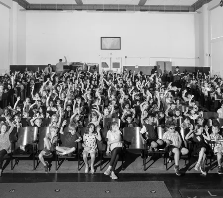 images of students in an auditorium