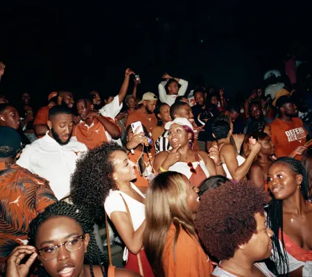 Photo of Black students at the University of Texas at Austin at a party for what seems to be UT's homecoming. 