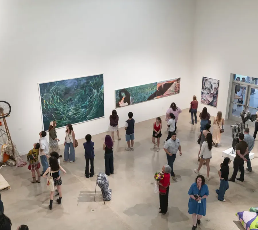 people in gallery during art opening