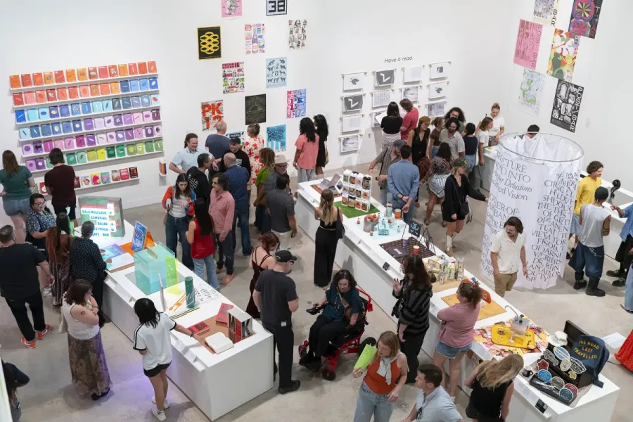 people in gallery during art opening